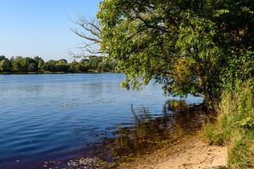 high water level in river Gauja, near Valmiera city in Latvia. summer trees surrounding