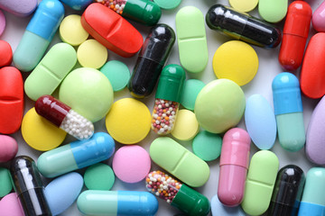 Pharmacy theme. Multicolored Isolated Pills and Capsules
