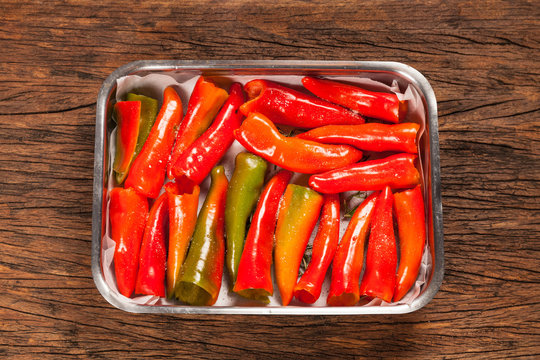 High view of pepperoni frigitelli on a wooden table. Vegetarian food