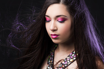 Naklejka premium Portrait of young beautiful woman brunette with bright makeup