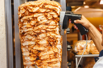 Street food from fried chicken kebab and shaurma is cooked on the square of Istanbul