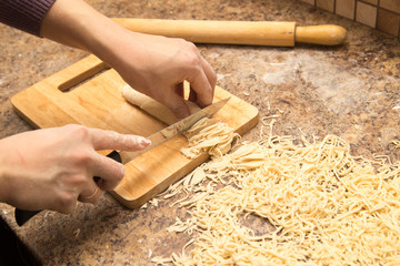 Preparation of home-made noodles in the kitchen