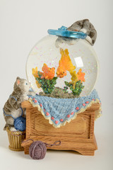 Beautiful snow globe with cats an fishes