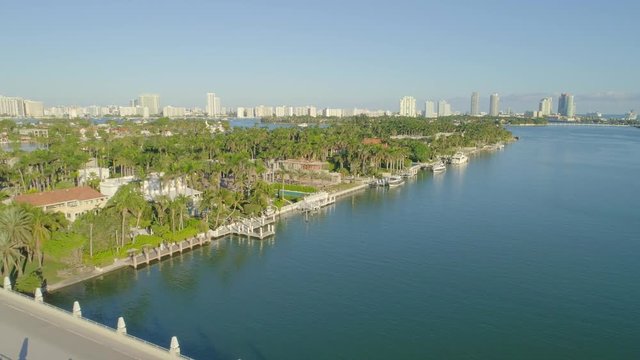 Aerial drone video luxury island mansions in Miami Beach waterfront 4k 24p