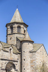 Fototapeta na wymiar Clocher de l'église du village de Nasbinals, étape sur le sentier de Saint Jacques de Compostelle classé Patrimoine Mondial de l'UNESCO