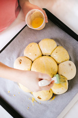 Swiss sweet bread with a golden paper crown and hidden miniature of king baked traditionally in Switzerland for Three Kings Day on January 6