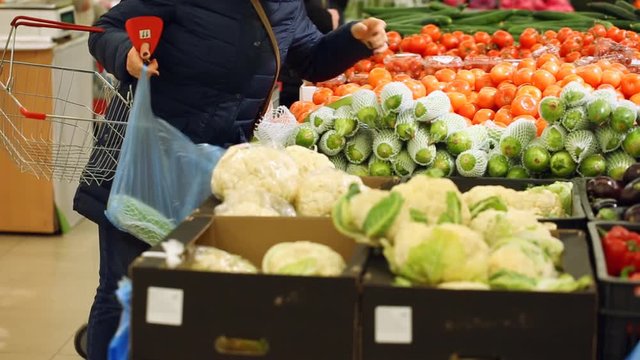 Customers at vegetable shop