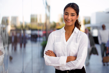 Independent entrepreneur female woman business executive type with bright cheerful smile