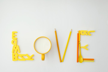 the word love is lined with yellow