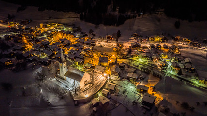 Night Aerial view of a Swiss village on Christmas - Switzerland - Wallis