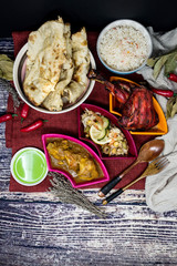 Handmade Indian food chicken tandoori and Tikka with garlic naan