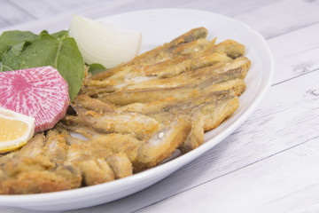 fried fish and salad