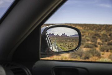 Monument Valley seen trough a rear-view mirror