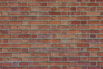 Red grunge brick wall pattern background.