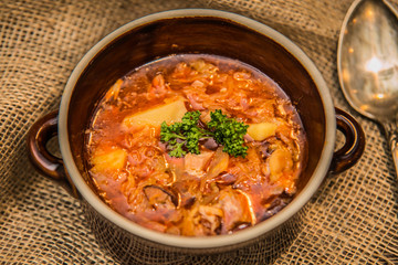 Food on a plate, on a wooden background.Food detail