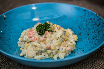 Food on a plate, on a wooden background.Food detail