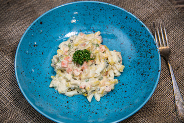Food on a plate, on a wooden background.Food detail