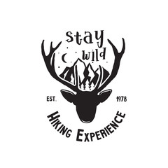 Hand drawn vintage camping badge and hiking label with hiking design elements and typography - stay wild. Stock Vector design