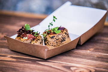 Food on a plate, on a wooden background.Food detail