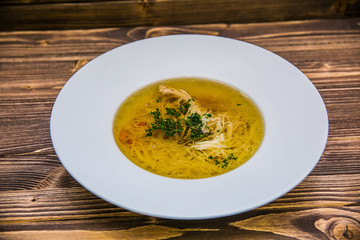 Food on a plate, on a wooden background.Food detail