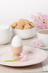 Hyacinth Flowers. Amaretti Biscuits. Boiled Egg. Cup Of Tea