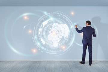 Businessman using digital planet earth interface on a wall 3D rendering