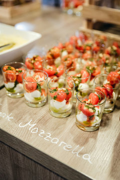 festive buffet with mozzarella and tomatoes in a glass