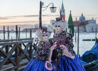 Venice, Italy - February 25, 2017: Famouse Venice Carnival. Masked people.