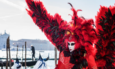 Venice, Italy - February 26, 2017: Famouse Venice Carnival. Masked people.