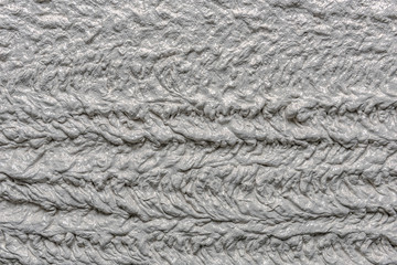 Mortar wall texture. with a pluster pump on the construction applied mortar wall. Concept: texture