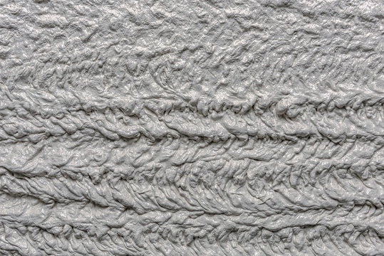 Mortar wall texture. with a pluster pump on the construction applied mortar wall. Concept: texture