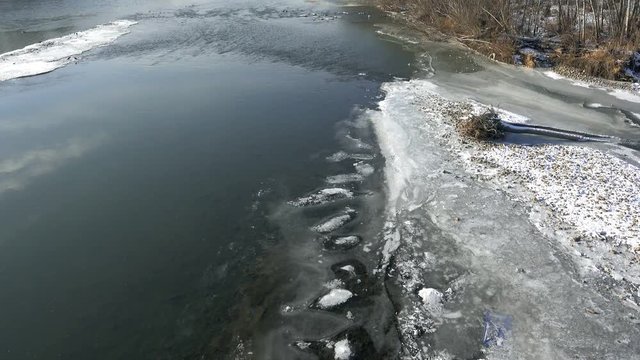 Freezing river in late autumn. Ulba River, Ust-Kamenogorsk. Kazakhstan. Full HD 1080p footage