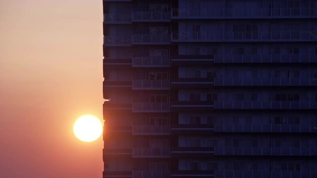 Sunrise behind highrise in Yokohama