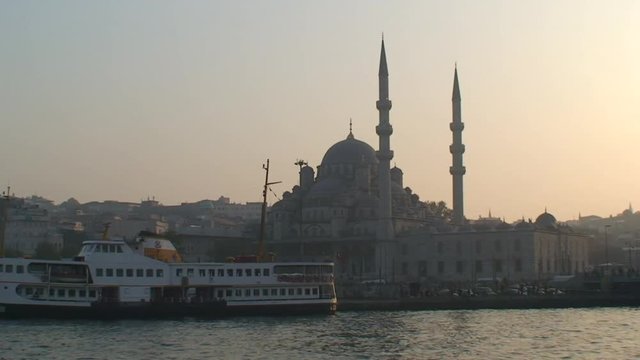 Ferries docked by Sultan Ahmed Mosque, low angle