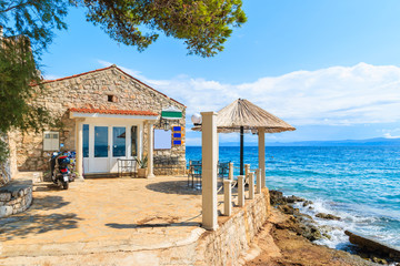 Typical small fishing restaurant on sea coast in Bol town, Brac island, Croatia