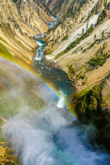 Yellowstone waterfall with rainbow at inspiration point