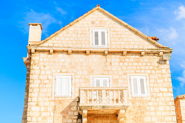 Fototapeta na wymiar Traditional stone house in Supetar port, Brac island, Croatia
