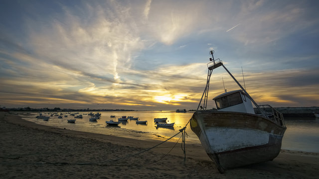 Boats On Guadalquivir River At Sanlucar De Barrameda Cadiz Spain