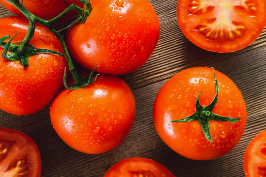 Freshly Washed Tomatoes on Cedar Table