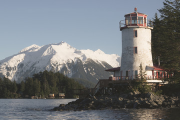 Lighthouse and Mountains