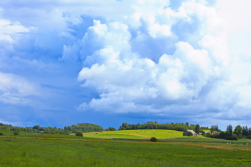 Cloudy above the country farm.