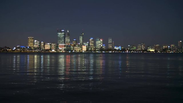 skyline of the city of perth and the swan river, western australia at night
