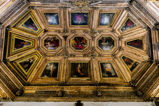 Ceiling of one of the interior room of the Porto's Cathedral, richly decorated with oil paintings and carved wood.