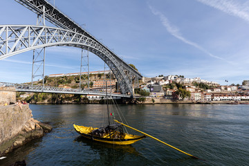  Rabelo boats, one of the most popular symbols of Porto, used to carry barrels of Porto wine from the Douro valley vineyards to the Port Wine cellars. © V. Korostyshevskiy