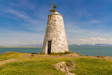 The old disused Twr Bach Lighthouse on Ynys Llanddwyn, Anglesey, Gwynedd, Wales, UK
