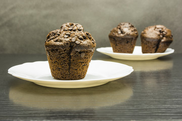 Chocolate cake (Muffin) on a white plate.