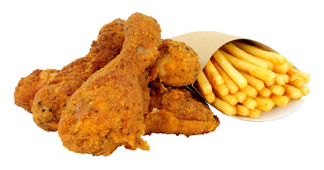 Southern fried chicken portions and French Fries in cardboard scoop isolated on a white background