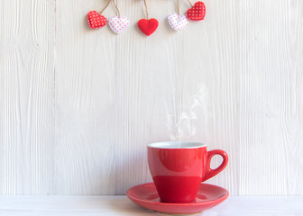 Valentine's Day with red cup coffee Sewed pillow hearts row border, wood white background, copy space  Valentine Concept.