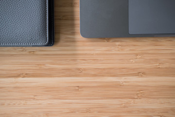computer laptop, notebook on wood desk at office workplace. business, workspace, education concept.
