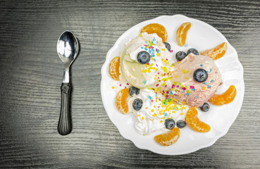 Top view of a plate with a frosty dessert.